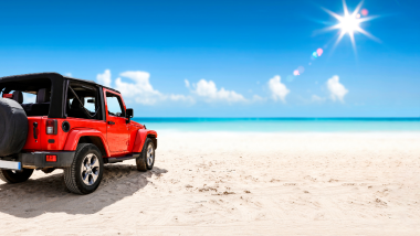 Red Jeep on beach