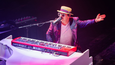 Man singing and playing piano
