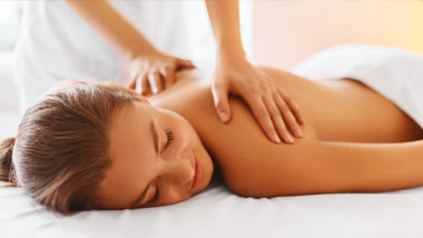 woman getting back massage