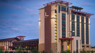 L'Auberge Casino Hotel Baton Rouge hotel tower at twilight