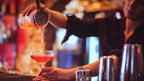 bartender pouring drink