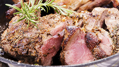 braised short ribs with parsley on top