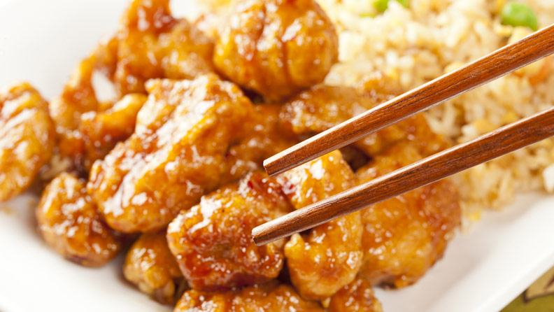 wooden chopsticks, general Tso's chicken and fried rice